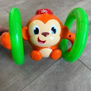 Bright Starts Roll & Glow Monkey Toy w/lights + music 6 months plus